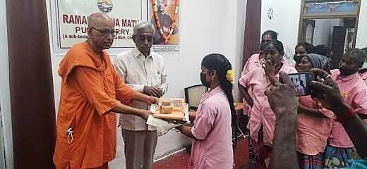 Distributed the Saree and Dhotis to Corporation workers.